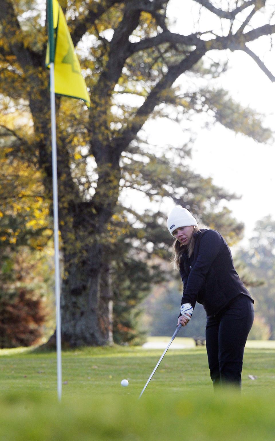 Colonel Crawford's Lucy Myers chips onto the green during the Girls Division II State Championships on Oct. 15 at the Ohio State Golf Club Gray Course.