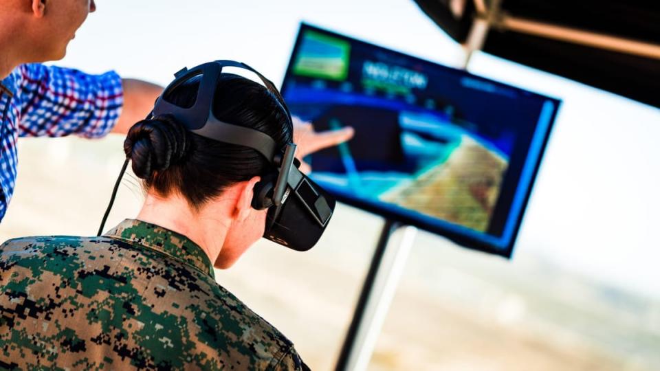 <div class="inline-image__caption"><p>A soldier tries the company's VR system for controlling its hardware </p></div> <div class="inline-image__credit">Anduril</div>