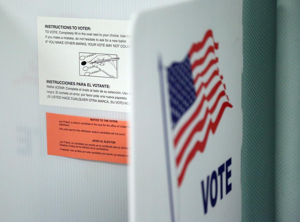 Voting instructions in both English and Spanish&nbsp;are seen&nbsp;on a booth&nbsp;before voters arrived at&nbsp;a polling station in Christmas, Florida, on&nbsp;Nov.&nbsp;8, 2016. (Photo: GREGG NEWTON via Getty Images)