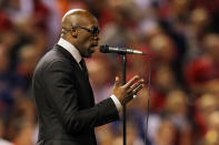 ST LOUIS, MO - OCTOBER 27: Recording artist Joe performs the national anthem prior to Game Six of the MLB World Series between the Texas Rangers and the St. Louis Cardinals at Busch Stadium on October 27, 2011 in St Louis, Missouri. (Photo by Jamie Squire/Getty Images)