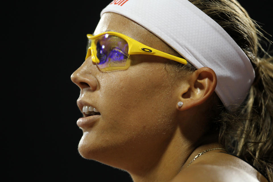 Lolo Jones of the US looks at the scoreboard after finishing third in the women's 100m hurdles at the IAAF Diamond League in Doha on May 6, 2011. AFP PHOTO/KARIM JAAFAR (Photo credit should read KARIM JAAFAR/AFP/Getty Images)