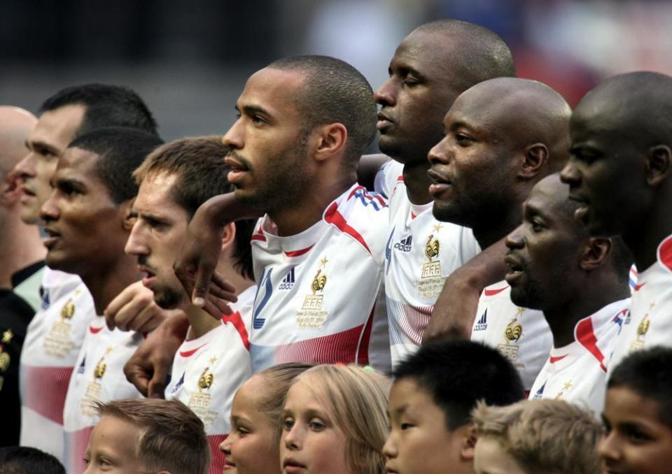 Patrick Vieira, Thierry Henry and Franck Ribéry listen to the national anthems before the final.