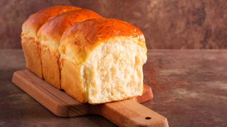 Japanese milk bread on a cutting board