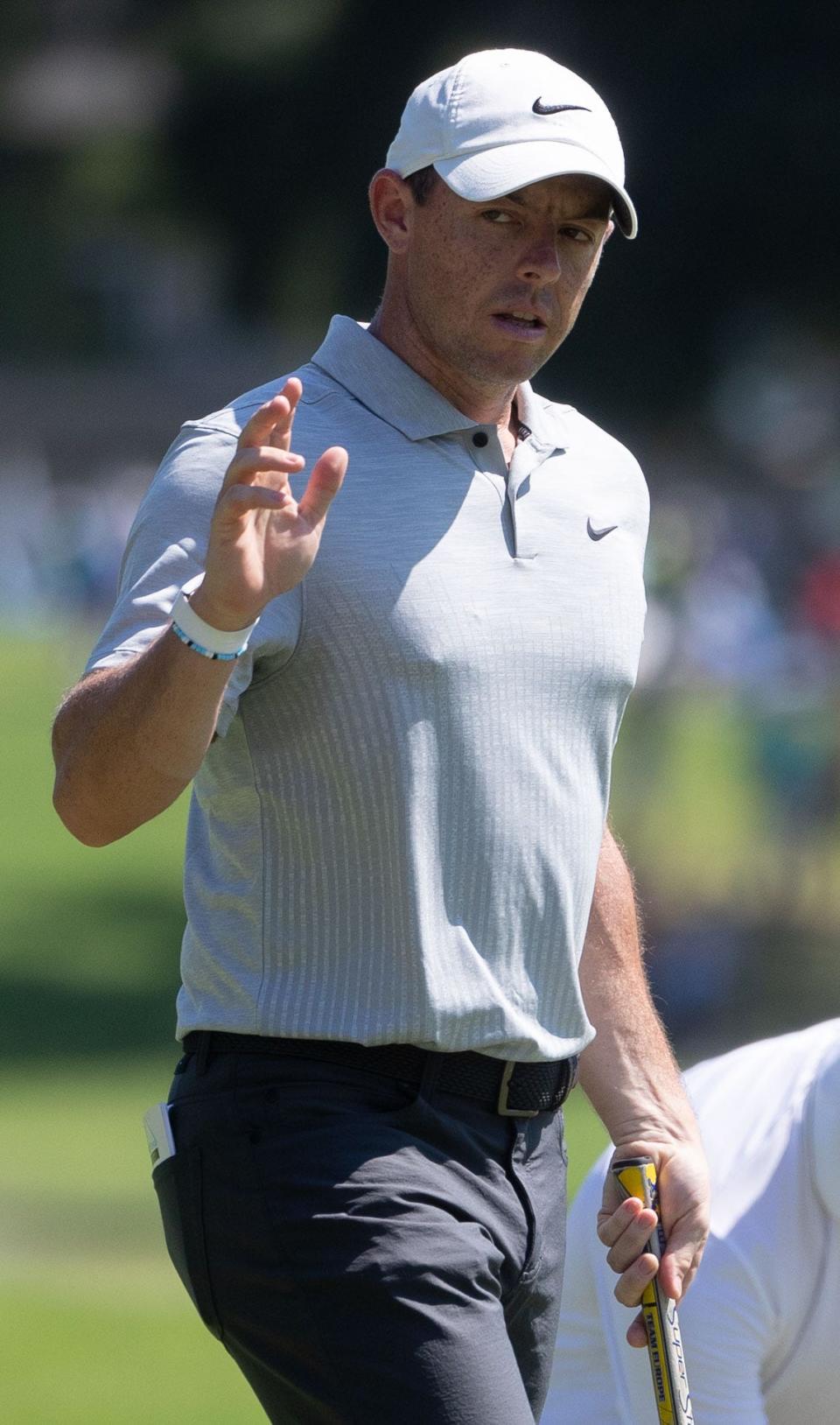 Rory McIlroy waves to the crowd from the 1st hole during the second-round of the FedEx St. Jude Championship on Friday, Aug. 12, 2022, at TPC Southwind in Memphis.