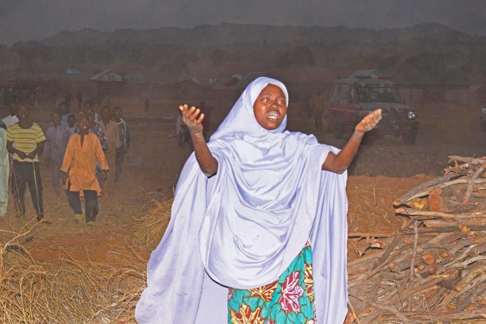 A woman cries as she calls upon the government to help and rescue school children that were kidnapped by gunmen in Chikun, Nigeria, Thursday, 7 March 2024 (AP)