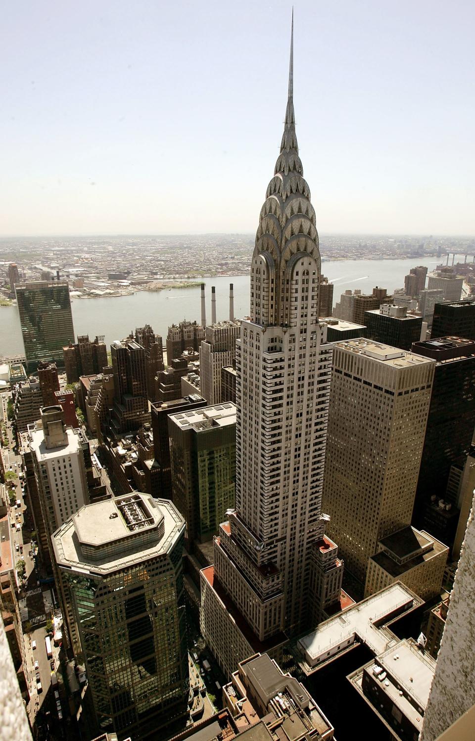 NEW YORK - MAY 27:  The Chrysler Building is seen from the roof of the Met Life building as the press were given a tour to mark the 75th Anniversary of the New York Landmark May 27, 2005 in New York City. The Art Deco building is now owned by Tishman Speyer Properties and was opened on May 27, 1930.  (Photo by Mario Tama/Getty Images)