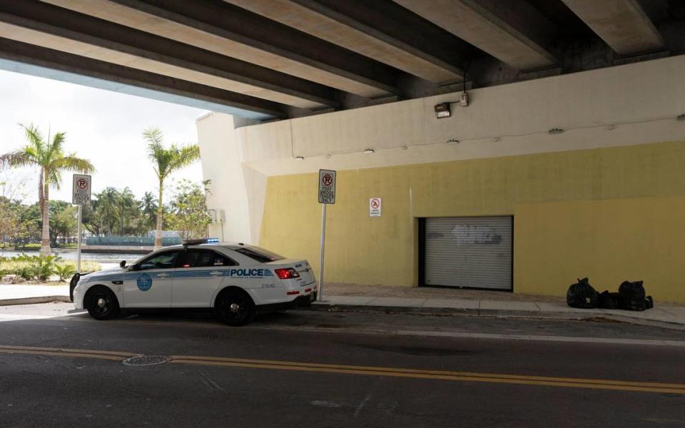 The area under Flagler St. bridge sits cleared out after City of Miami Police tell the homeless to vacate the area on Thursday, Feb. 29, 2024 by the river in Miami. According to the group of homeless persons, the shelters in the area are full.