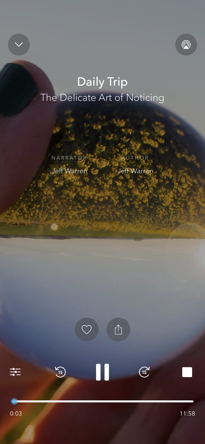 a person's hand holds a sphere in a screenshot of the meditation app Calm