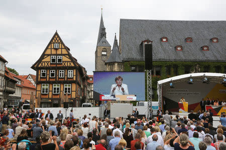 German Chancellor Angela Merkel a top candidate for the upcoming general elections of the Christian Democratic Union party (CDU) gives a speech during an election campaign rally in Quedlinburg, Germany, August 26, 2017. REUTERS/Reinhard Krause