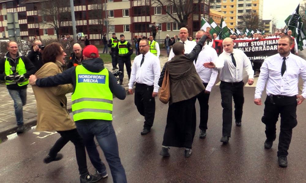 Rightwing Nordic Resistance Movement marchers confronted by leftwing activists in Borlange, Sweden, on 1 May 2016.