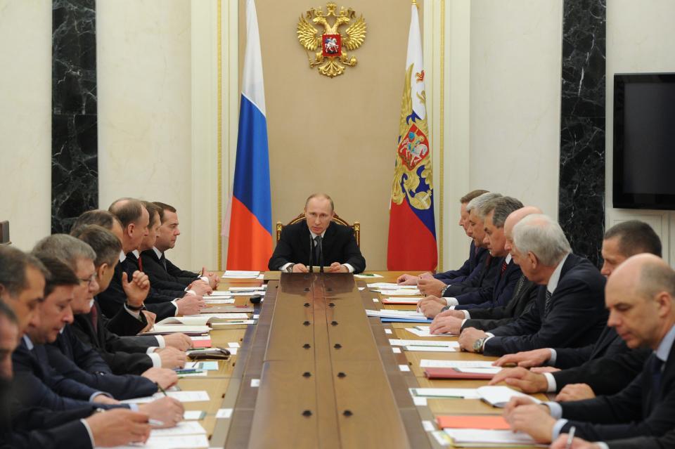 Russian President Vladimir Putin, center, chairs a Security Council meeting in the Kremlin in Moscow, Russia, Tuesday, April 22, 2014. (AP Photo/RIA-Novosti, Mikhail Klimentyev, Presidential Press Service)