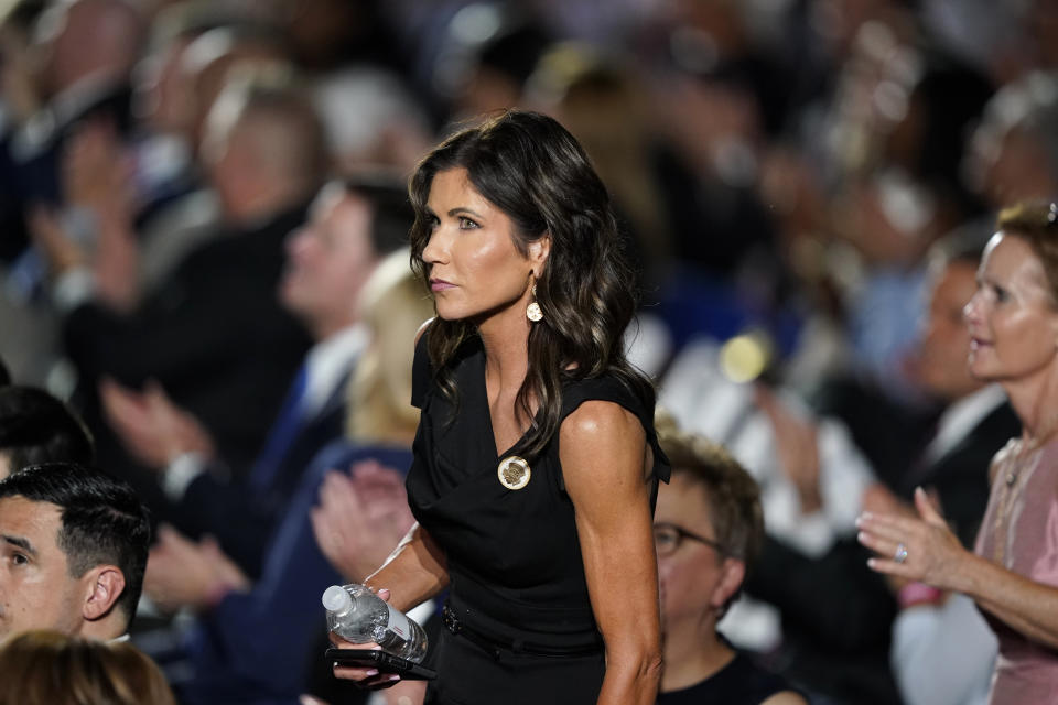South Dakota Gov. Kristi Noem stands in the crowd on the South Lawn of the White House during the fourth day of the Republican National Convention, Thursday, Aug. 27, 2020, in Washington. (AP Photo/Alex Brandon)