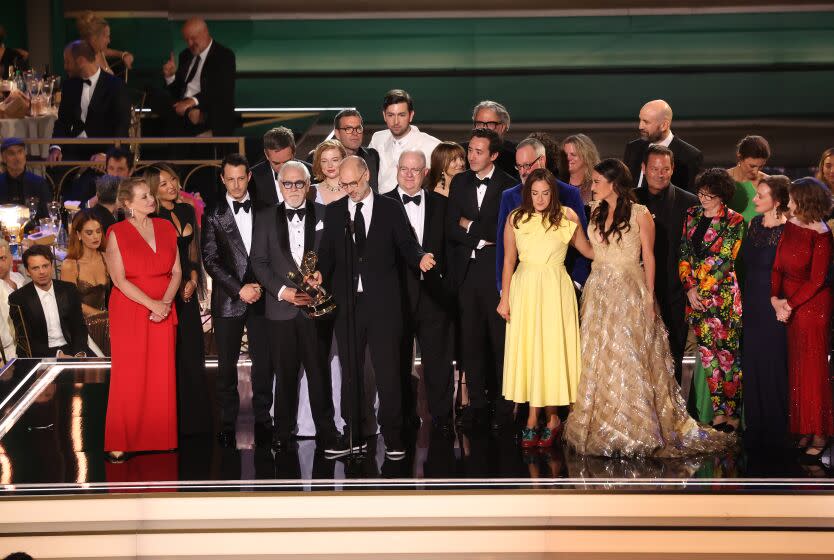 LOS ANGELES, CA - September 12, 2022 - Jesse Armstrrong and the cast accept the Emmy for Outstanding Drama Series for ÒSuccessionÓ during the 74th Annual Primetime Emmy Awards held at the Microsoft Theater on September 12, 2022. (Myung J. Chun / Los Angeles Times)