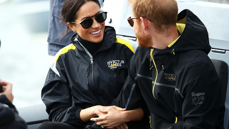 Meghan Markle and Prince Harry wore their matching Invictus Games jackets as they took to the harbour. Photo: Getty