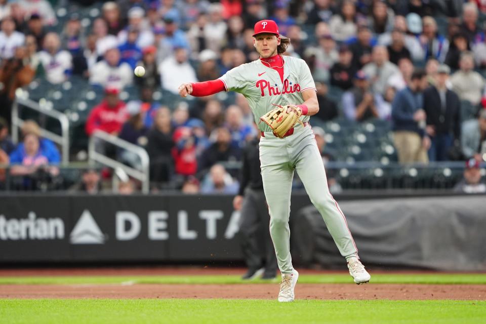 Philadelphia Phillies third baseman Alec Bohm throws out New York Mets shortstop Francisco Lindor after fielding a ground ball during the first inning on Monday, May 13, 2024, at Citi Field in New York.