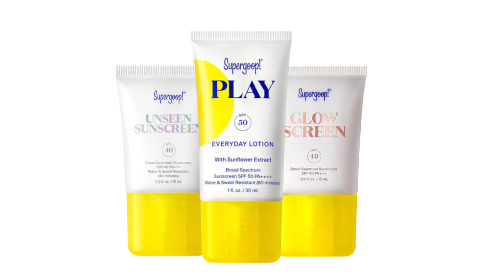 Yellow-capped trio of tubes of sunscreen. 