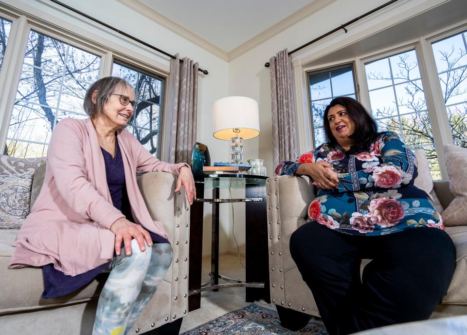 Amy Waldman, left, and Tehmina Akbar have a discussion about the importance of maintaining their bond despite the war in the Middle East.