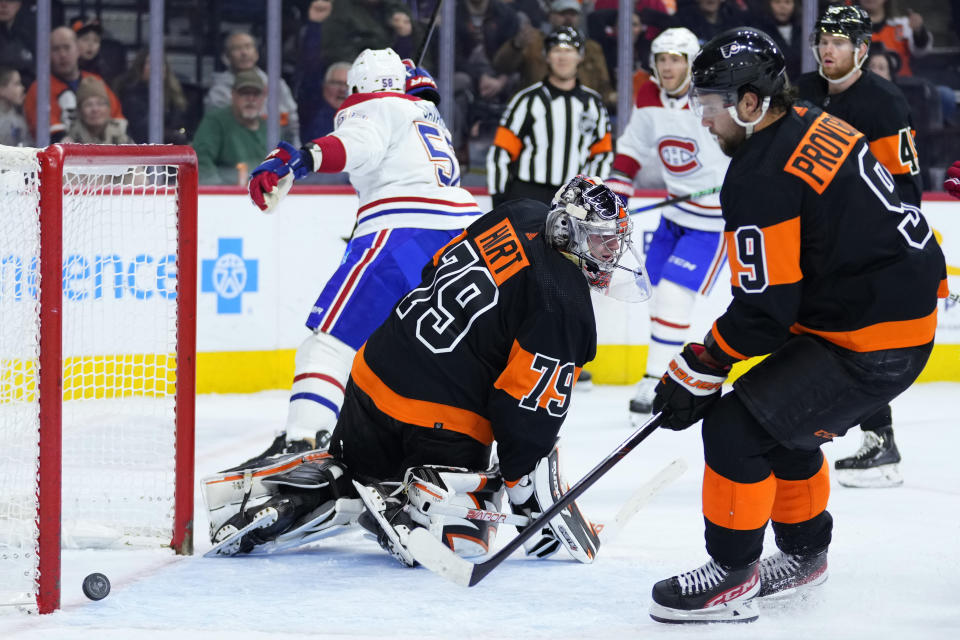 Philadelphia Flyers' Carter Hart (79) reacts after giving up a goal to Montreal Canadiens' David Savard (58) during the first period of an NHL hockey game, Friday, Feb. 24, 2023, in Philadelphia. (AP Photo/Matt Slocum)