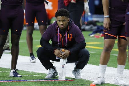 FILE PHOTO: Mar 2, 2019; Indianapolis, IN, USA; Oklahoma quarterback Kyler Murray (QB11) watches during the workouts during the 2019 NFL Combine at Lucas Oil Stadium. Mandatory Credit: Brian Spurlock-USA TODAY Sports - 12275239