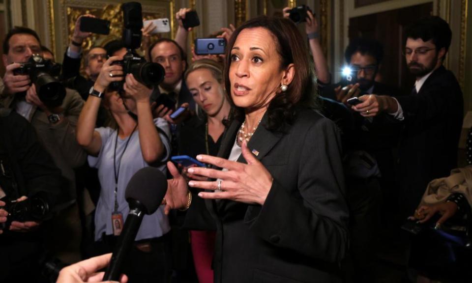 Kamala Harris speaks to members of the media after presiding over the vote.