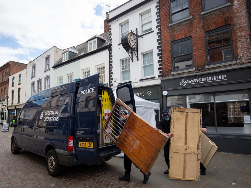 Police remove wooden doors from the Clean Plate cafe in Gloucester ahead of excavation works in the search for a suspected Fred West victimJoe Giddens/PA