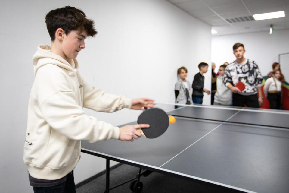 Boy playing ping pong 