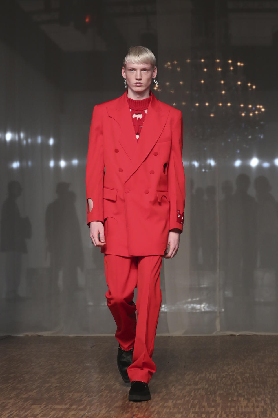 A model presents a creation for Off White Men's Fall/Winter 2019-2020 fashion collection presented in Paris, Wednesday Jan. 15, 2020. (AP Photo/Thibault Camus)