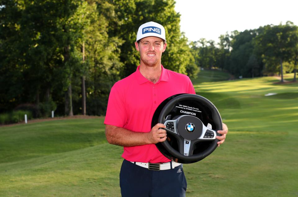 GREER, SC - JUNE 13: Mito Pereira of Chile holds the championship trophy after winning the BMW Charity Pro-Am presented by Synnex Corporation at the Thornblade Club on June 13, 2021 in Greer, South Carolina. (Photo by Hunter Martin/Getty Images)