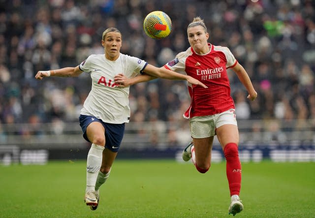 Tottenham’s Celin Bizet Ildhusoy (left) and Arsenal's Steph Catley battle for the ball (Jonathan Brady/PA)