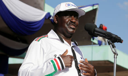 Kenyan opposition leader Raila Odinga of the National Super Alliance (NASA) coalition addresses supporters after he was announced as the presidential candidate for the 2017 general elections during a rally at the Uhuru Park grounds, in Nairobi, Kenya, April 27, 2017. REUTERS/Thomas Mukoya