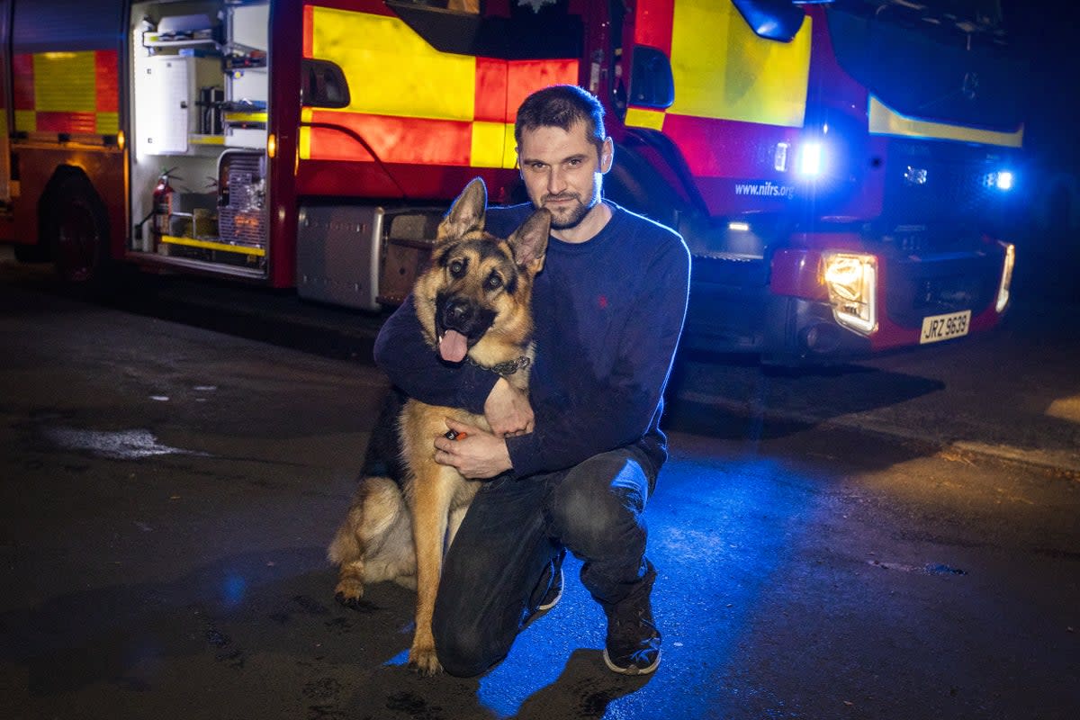 19-month-old German Shepherd Koba with owner William Herron after Northern Ireland Fire and Rescue Service (NIFRS) were called to help rescue the dog from the river close to Magheramorne Presbyterian Church outside Larne, Co Antrim. (Liam McBurney/PA) (PA Wire)