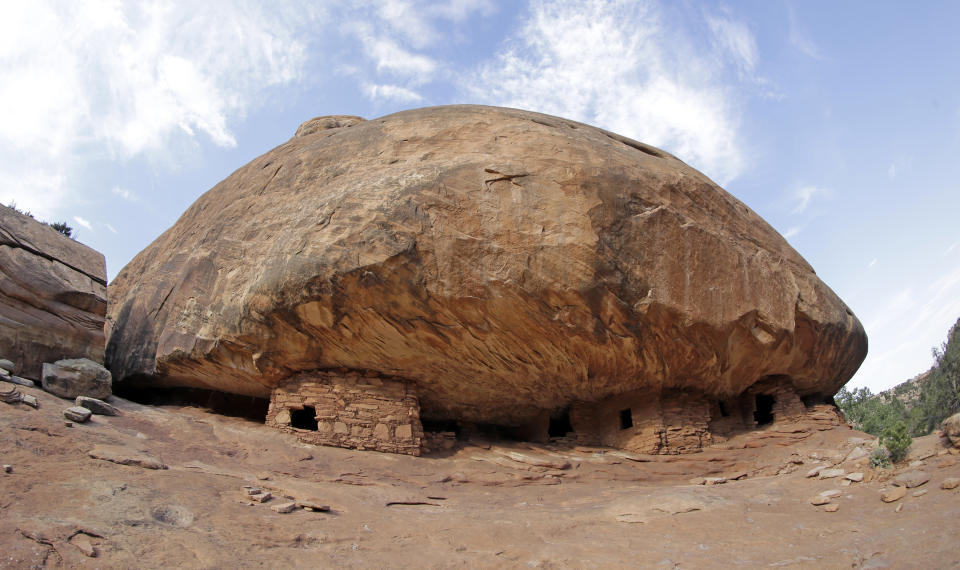 FILE - This June 22, 2016, file photo, shows the "House on Fire" ruins in Mule Canyon, near Blanding, Utah. A federal judge has rejected the Trump administration's bid to dismiss lawsuits challenging the constitutionality of a 2017 decision to downsize two sprawling national monuments in Utah. (AP Photo/Rick Bowmer, File )