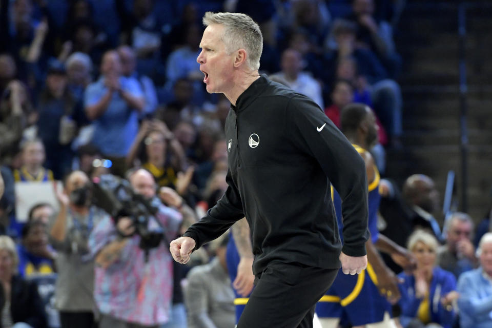 Golden State Warriors head coach Steve Kerr shouts toward a referee in the first half of an NBA basketball game against the Memphis Grizzlies Friday, Feb. 2, 2024, in Memphis, Tenn. (AP Photo/Brandon Dill)