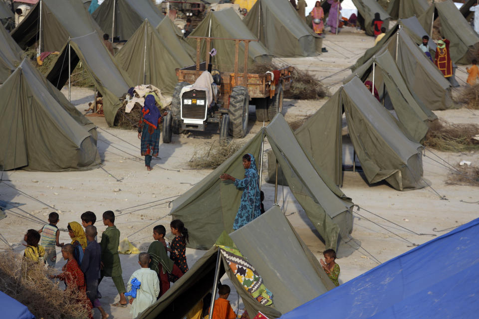 Temporary tent housing for flood victims is organized by the Chinese government, in Sukkur, Pakistan, Wednesday, Sept. 7, 2022. (AP Photo/Fareed Khan)