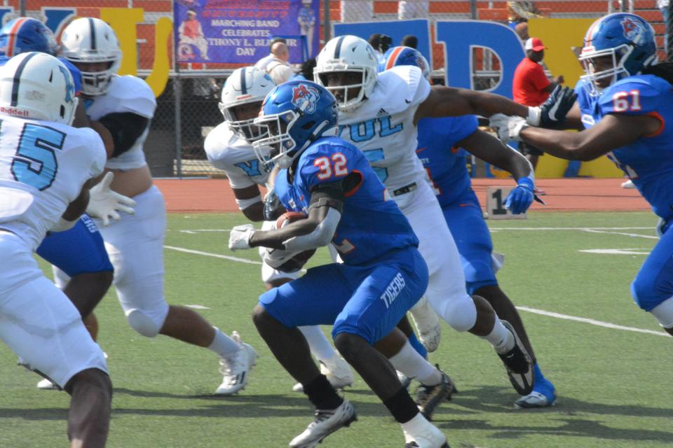 Savannah State running back Joseph Hampton attempts to find a running lane during Saturday's game.