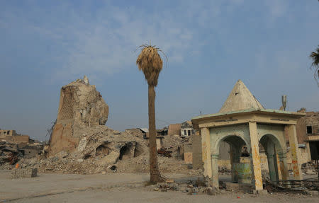 The destroyed al-Hadba minaret at the Grand al-Nuri Mosque is seen in the Old City of Mosul, Iraq January 17, 2018. REUTERS/Ari Jalal/Files