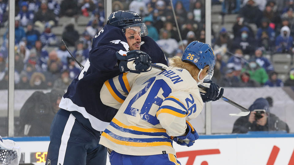 Maple Leafs forward Auston Matthews, left, has been suspended for his actions in the Heritage Classic. (Photo by Claus Andersen/Getty Images)