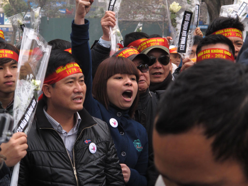 Anti-China protestors rally in the Vietnamese capital Sunday, Feb. 16, 2014 to mark the 35th anniversary of a border war between Vietnam and China. Vietnam is wary of all forms of public protest and often quashes anti-China gatherings (AP Photo/Chris Brummitt)