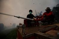 The Wider Image: Indonesia's firefighters on frontline of Borneo's forest blazes