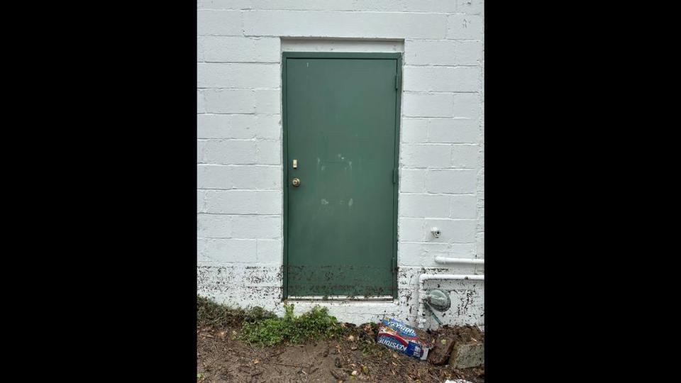 Dirt scars the backdoor to NEC Technology Repairs on July 16, 2024. This time, the water came in through this door, though, in past floods, it came through the building’s toilet.