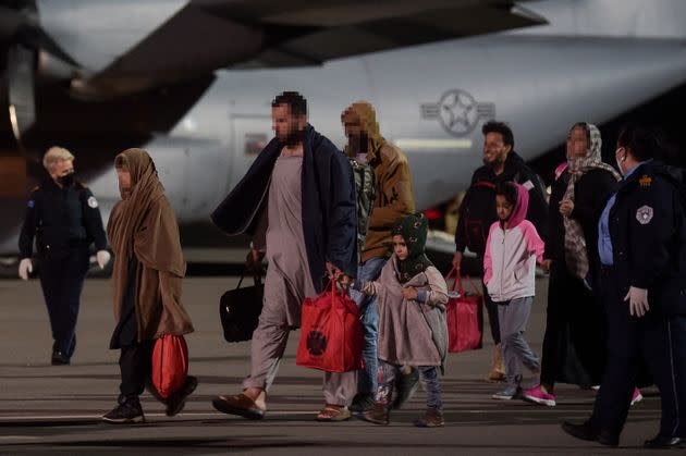 Afghan refugees exit a U.S. Air Force plane at Pristina International airport near Pristina, Kosovo, on Aug. 29, 2021. (Photo: ARMEND NIMANI via Getty Images)