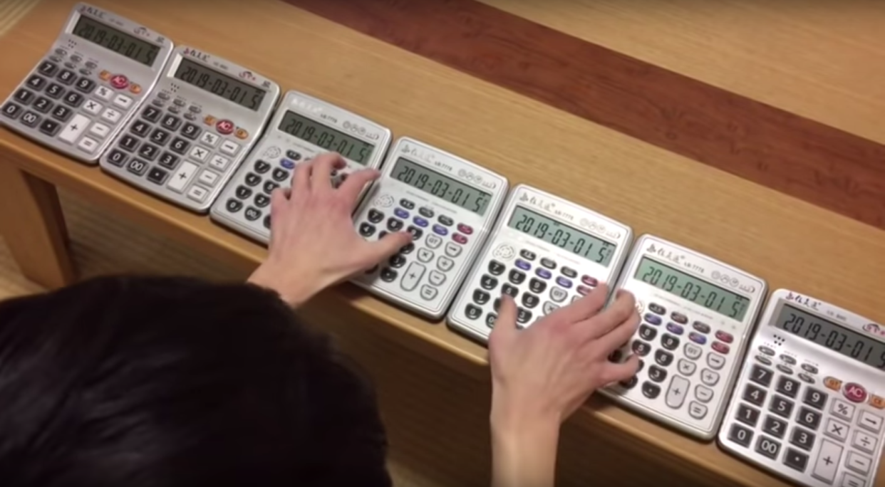 Japanese YouTuber Atarime uses up to seven calculators at a time to make music.