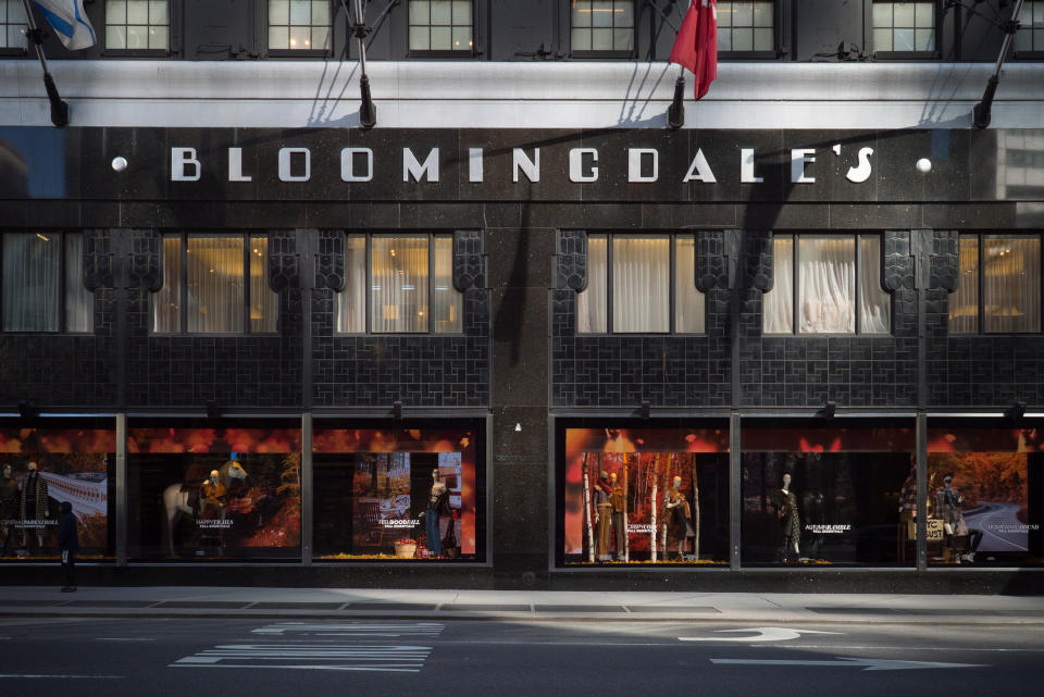 Exterior view of Bloomingdale's department store with display windows and flags above