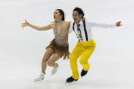 Kana Muramoto, left, and Daisuke Takahashi of Japan perform during a rhythm dance of an ISU Grand Prix of Figure Skating competition in Kadoma near Osaka, Japan, Friday, Nov. 27, 2020. (AP Photo/Hiro Komae)