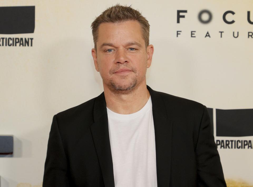 Matt looks serious while attending an event in a white tee and black blazer