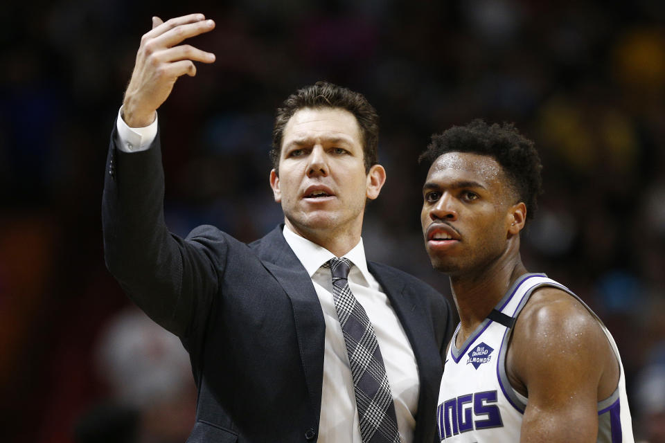 MIAMI, FLORIDA - JANUARY 20:  Head coach Luke Walton of the Sacramento Kings reacts with Buddy Hield #24 against the Miami Heat during the second half at American Airlines Arena on January 20, 2020 in Miami, Florida. NOTE TO USER: User expressly acknowledges and agrees that, by downloading and/or using this photograph, user is consenting to the terms and conditions of the Getty Images License Agreement.  (Photo by Michael Reaves/Getty Images)