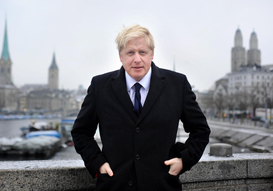 Mayor of London Boris Johnson poses beside the river in Zurich, Switzerland.