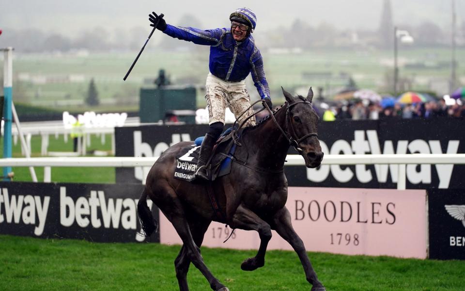 Paul Townend celebrates his Champion Chase triumph on board Energumene - PA