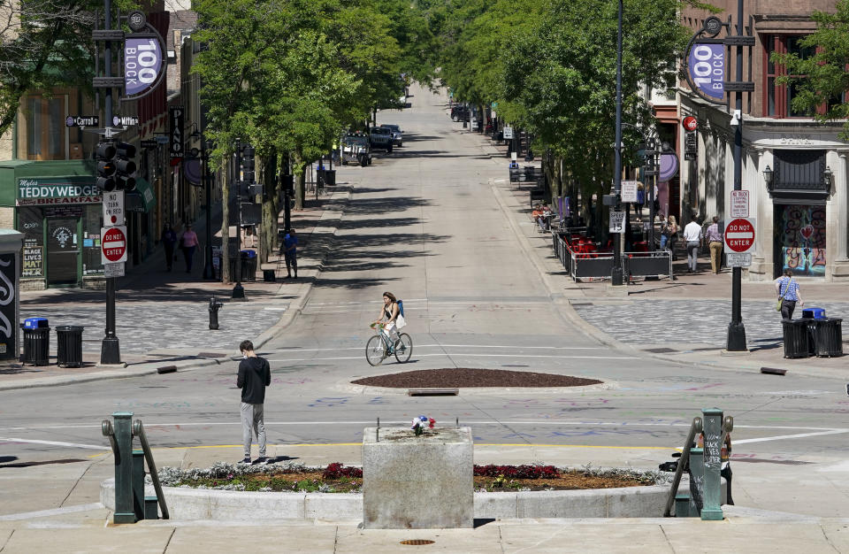 A pedestal where the Forward statue once stood sits empty, Wednesday, June, 24, 2020, in Madison, Wis. Protesters tore down statues of Forward and a Union Civil War colonel. They also assaulted a state senator and damaged the Capitol, Tuesday night after the arrest of a Black activist earlier in the day. (Steve Apps/Wisconsin State Journal via AP)