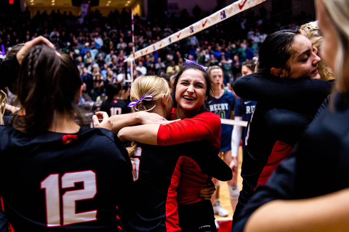 Ava Ash hugs Karine Morrison in celebration after Colleyville Heritage beat Frisco Reedy in the 5A state final at the Curtis Culwell Center in Garland on November 19th, 2022.